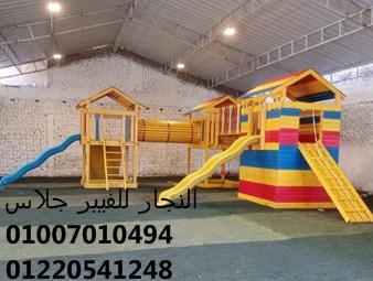 مجموعة ألعاب أطفال داخلية (Indoor) بألوان مبهجة تضم زحاليق فيبر جلاس وهياكل تسلق على عشب صناعي، مصممة بأعلى معايير الجودة لتجهيز كيدز اريا ومناطق ترفيهية مغلقة في مصر.